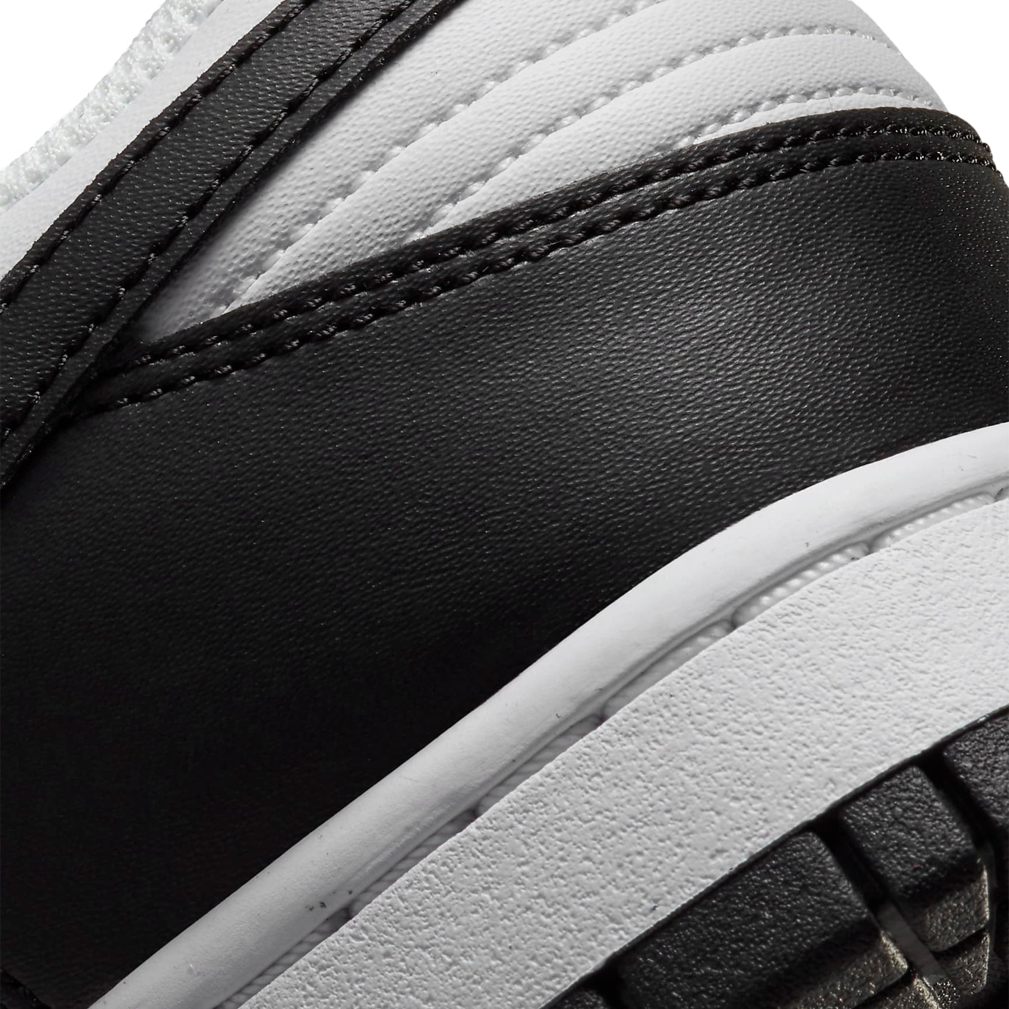 Heel view of Nike Dunk Low Next Nature Panda (W) DD1873-102